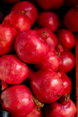 Healthy pomegranate fruit, background, close up top view.
