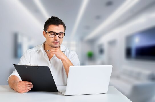 One business male working remotely on laptop, AI generated image