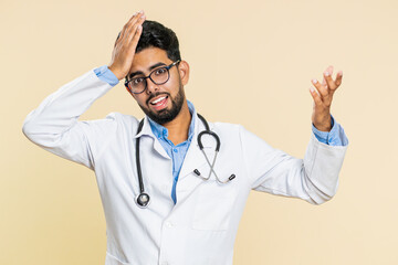 Indian young doctor cardiologist man feeling hopelessness and loneliness, nervous breakdown, loses,...