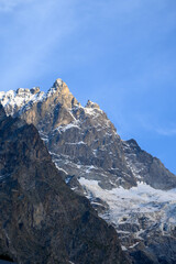 Fototapeta premium La Grave La Meije Ski off-piste resort, unique in Alps with single groomed slope on the glacier, freeride, view on peak La Meije, Massif des Ecrins, Hautes Alpes, France in summer