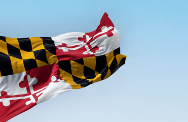 Maryland state flag waving on a clear day