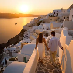 Poster Couple looking at White Greek Houses next to the Sea at Sunset © Daniel