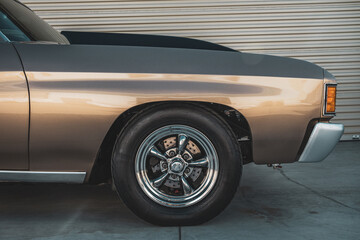 Abstract front profile view of classic American muscle drag car.