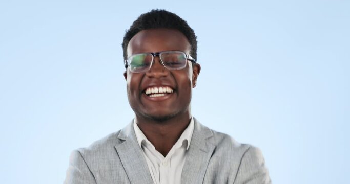 Black man, glasses and face with lens frame and smile from work and eye care in a studio. African male professional, portrait and happy fro Kenya with confidence from lawyer job with blue background