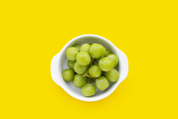 Shine muscat grape on yelloe background.