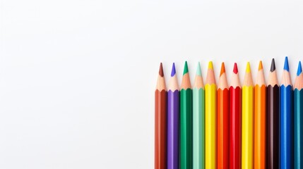 Fototapeta premium A set of colored pencils on a plain empty white background. Generative AI. 