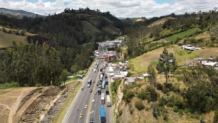 IPIALES, COLOMBIA - October 3, 2023: some cars driving through the migration checkpoint in the...
