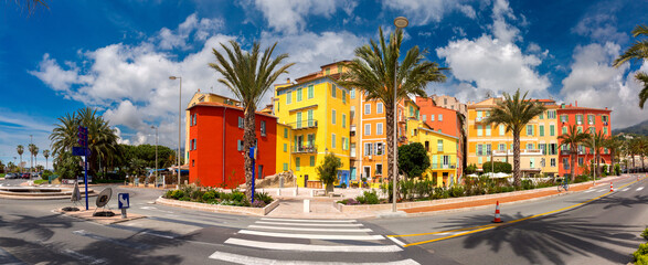 Colorful cosy houses in the Old Town of Menton, perle de la France, French Riviera, France - obrazy, fototapety, plakaty