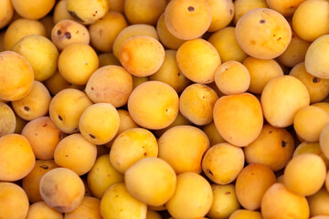 yellow wild peach fruit background 
