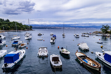 Sailing boats, boats, yachts anchored close to the shore in the Mediterranean Sea. A hot sunny...