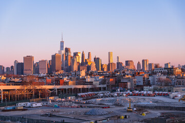 Municipal parking lot in Brooklyn with the Manhattan sunrise in the background
