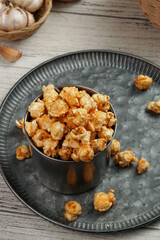 popcorn with various flavors ranging from cheese, green tea, chocolate, balado, onion chicken and others