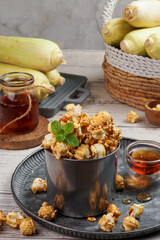 popcorn with various flavors ranging from cheese, green tea, chocolate, balado, onion chicken and others