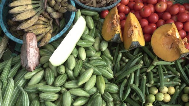 Variety of raw vegetable sale on market.