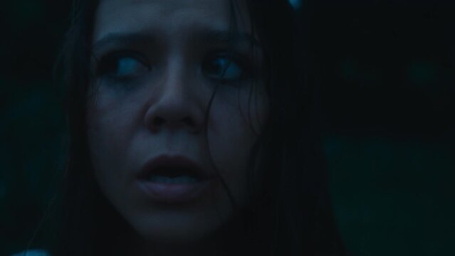 A frightened girl in a bloody dress got lost in the woods