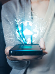 Young woman hold mobile phone.cloud technology process to connect a information network.Business...