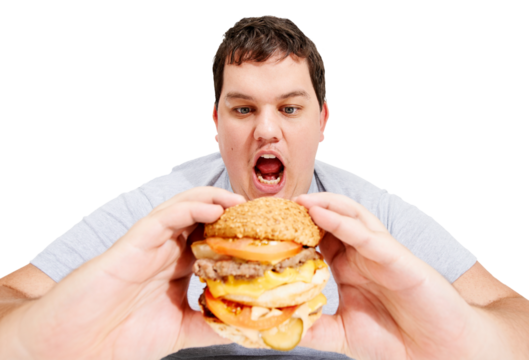 Man, burger and holding for eating, mouth and isolated on transparent png background. Fat person, condiments and unhealthy for diet, meat and obesity from lunch for hungry, overweight and fast food