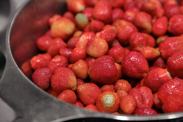 Strawberry berries in a large bowl. Berries for cooking jam.