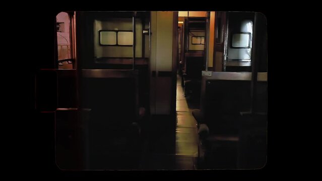 Walking in slow-motion in the past: a (fake) Super 8mm film of an empty (real, original) passenger train's cabin from the 1960s. Nobody inside.
