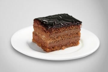 A piece of chocolate tasty sweet cake with cream