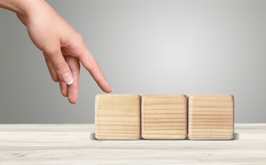 Task priority concept. Wooden cubes with numbers