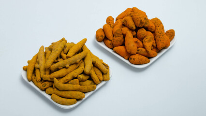 Spice up your dishes with turmeric powder, a pantry essential known for its flavor enhancement and potential health perks.