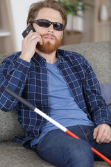 blind man on the phone