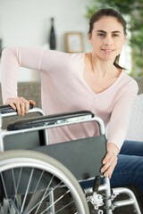 happy confident young woman on a sofa