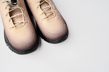 Pair of new sneakers isolated on white background