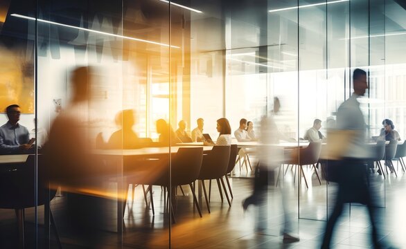 Coworking Space Office. Blurred Silhouettes Of People In A Coworking Space Or Office Space. 