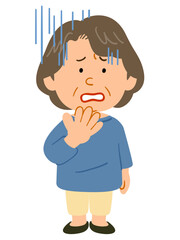 青ざめる青いカットソーを着たシニアの女性　全身
