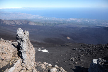 Mount Etna, Sicily, Italy. Slopes of volcano are covered with volcanic ash and frozen lava. Summer...