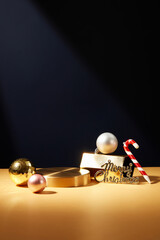 Round-shaped golden podium decorated with baubles. Empty space on the podium to show goods or...