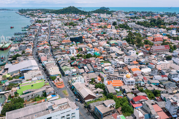 Fototapeta na wymiar Aerial cityscape of ancient Capital Gate at old town in Songkhla City, Thailand. Text on white Capital gate is Mueang Songkhla.