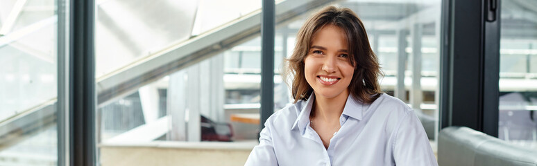 pretty young woman in smart casual outfit smiling and looking at camera, coworking concept, banner