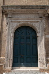 Ancient building with a large wooden door