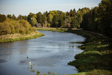 View of the open-air museum in the Polish village and the river