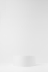 Abstract one white round podium for cosmetic products, mockup, front view on white background. Scene for presentation products, gifts, goods, advertising, design, sale, text, display, showing.