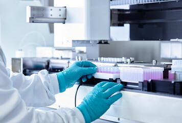 Scientist examining medical sample in laboratory