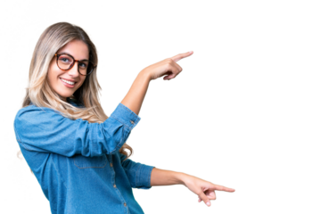 Young Uruguayan woman over isolated background pointing finger to the side and presenting a product