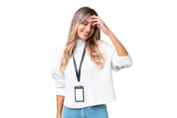 Fototapeta premium Young Uruguayan woman with ID card over isolated background laughing