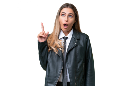 Business pretty Uruguayan woman wearing a biker jacket over isolated background thinking an idea pointing the finger up