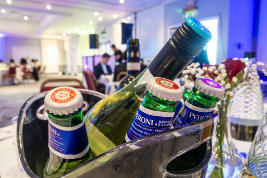 Bottles of Peroni beer served on a table at a party