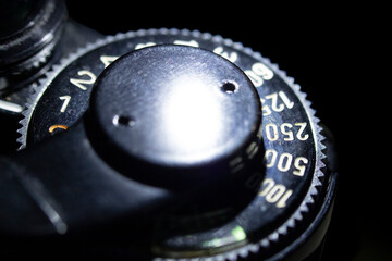 Film camera shutter ring close up. Vintage analog film camera macro. 
