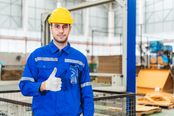 Professional male caucasian engineer or manufacturing worker man person in factory portrait, smart...