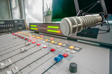 Professional microphone and sound mixer in radio station studio