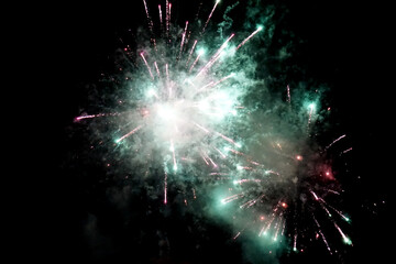 Fireworks in the black night sky