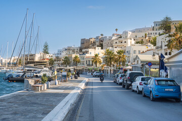 The main road through Naxos Town on the island of Naxos one of the Cyclades islands in Greece