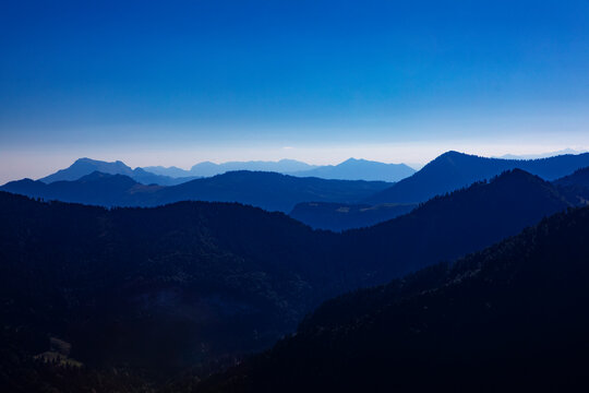 Austria, Salzburger Land, Drone view of Salzkammergut mountains at foggy dawn
