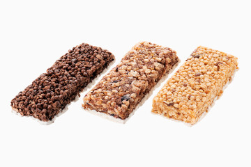 Oat and nut bar isolated on white. Granola bar. Healthy sweet dessert snack. Cereal granola bar with nuts, fruit and berries. Healthy munchies. 